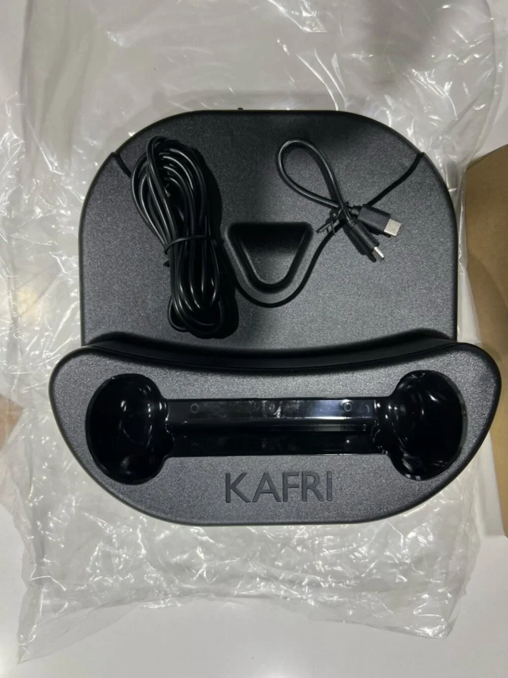 KAFRI Charging Dock, specifically designed as a charging station and display sta